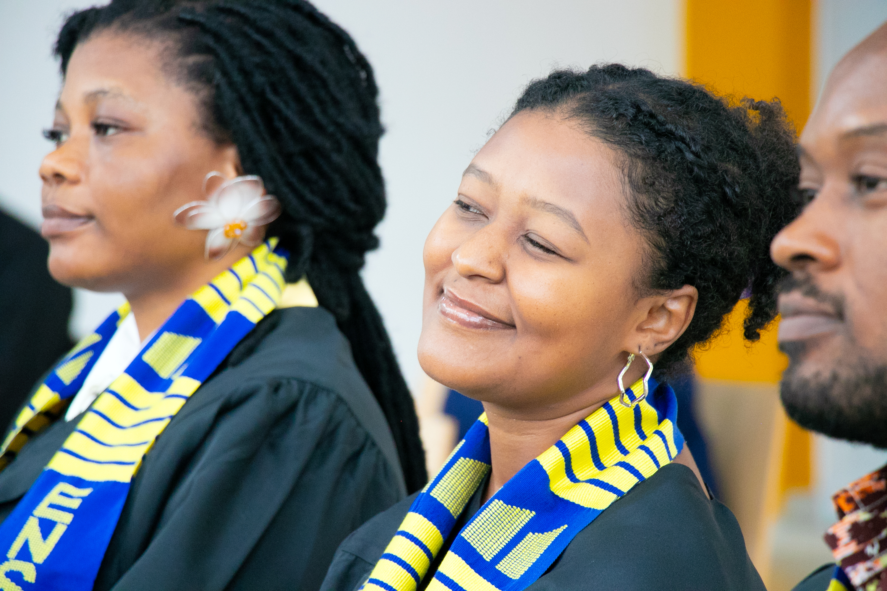 A newly matriculated student smiles during the proceedings, one of many who were officially welcomed into the Ensign Global University community.