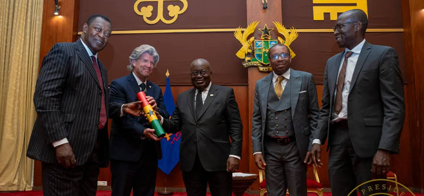 Ensign Global delegates pictured alongside President Akufo-Addo.